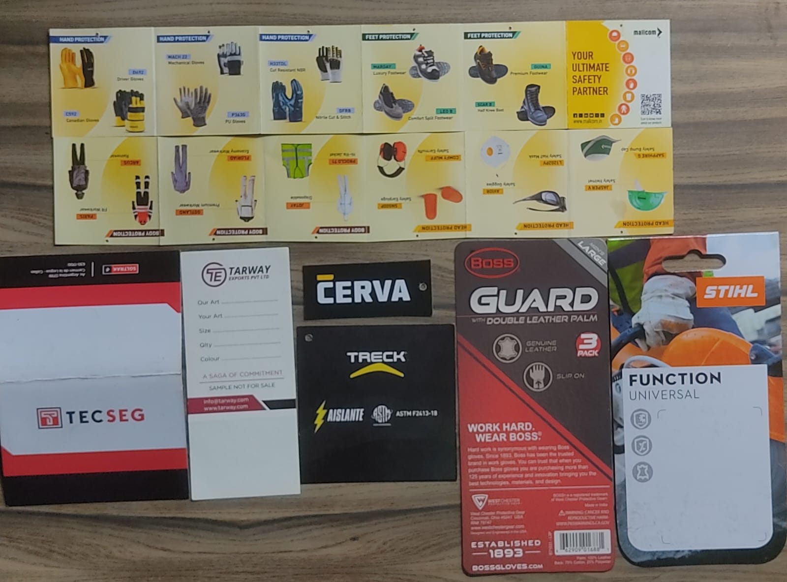 Printed hang tags and header cards produced by Fotoset for safety glove and PPE brands